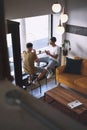 FriendsCoffee The perfect blend. two young men talking while having coffee together in a cafe. Royalty Free Stock Photo