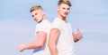 Friendship of brothers. Benefits and drawbacks of having identical twin brother. Men twins brothers muscular guys in Royalty Free Stock Photo