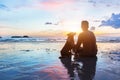 Friendship concept, man and dog sitting together Royalty Free Stock Photo