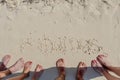 Friendship Etched in Sand: Vacationers inscribe 'Bahamas' on Great Stirrup Cay's Shore