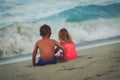 Friendship, family beach vacation- little boy and girl looking at sea Royalty Free Stock Photo