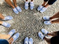 Friendship goals, School friends wearing the same shoos for a vacation Royalty Free Stock Photo