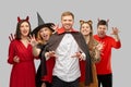 Friends in halloween costumes scaring Royalty Free Stock Photo