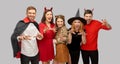 Friends in halloween costumes scaring Royalty Free Stock Photo