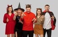 Friends in halloween costumes scaring Royalty Free Stock Photo