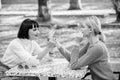 Friendship meeting. Girls friends drink coffee talk. Conversation of two women cafe terrace. Friendship friendly close Royalty Free Stock Photo