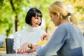 Friendship meeting. Trustful communication. Friendship or rivalry. Girls friends drink coffee talk. Conversation of two Royalty Free Stock Photo
