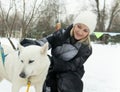 park outdoor friendship season husky winter snow person girl dog pet adult animal young woman