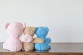 Friendship -three teddy bears holding in one`s arms Royalty Free Stock Photo