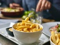 Fries with mayonaise in restaurant