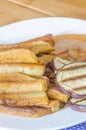 Fries potatoes with grilled eggplant