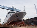 Frigate is being repaired in a dry dock at Blohm und Voss in Hamburg