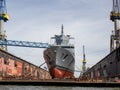 Frigate is being repaired in a dry dock at Blohm und Voss in Hamburg