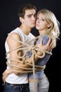 Frighten couple bound with ropes