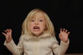Frightened blond girl Royalty Free Stock Photo