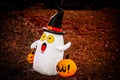 Frightened ghost lawn ornament for Halloween - blow up ghost with pilgrim hat and trick or treat pumpkin