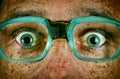 Frightened look of a man in old glasses Royalty Free Stock Photo