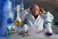 Frightened scientist front of experiment that exploded Royalty Free Stock Photo