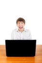 Frightened Teenager behind Laptop Royalty Free Stock Photo