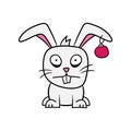 Frightened tired cartoon rabbit with a Christmas ball in his ear. Symbol of 2023