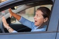 Frightened woman in car