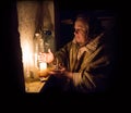 Frightened woman hide from explosions in the basement. During the sirens due to the shelling of Kyiv. Ukraine. 26 February 2022