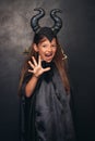 Scary girl in devil costume