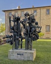 Frightening metal sculpture on a concrete base in Castiglione del Lago, Italy