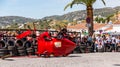 FRIGILIANA, SPAIN - MAY 13, 2018 `Autos Locos` - traditional fun involving the ride of cardboard cars in small spanish town Royalty Free Stock Photo