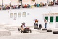 FRIGILIANA, SPAIN - MAY 13, 2018 `Autos Locos` - traditional fun involving the ride of cardboard cars in small spanish town Royalty Free Stock Photo