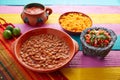 Frijoles mexican beans with rice and sauces Royalty Free Stock Photo