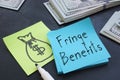 Fringe Benefits are shown on the business photo using the text Royalty Free Stock Photo