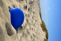 Frisbee in sand