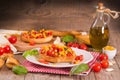 Friselle with tomatoes and mais. Royalty Free Stock Photo