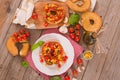 Friselle with tomatoes and mais. Royalty Free Stock Photo