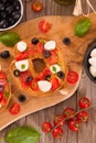 Friselle with tomatoes and mozzarella cheese. Royalty Free Stock Photo
