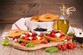Friselle with tomatoes and mozzarella cheese. Royalty Free Stock Photo