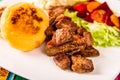 Fritada, fried pork, traditional ecuatorian dish. Royalty Free Stock Photo
