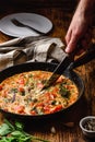 Frittata with broccoli, red bell pepper and red onion