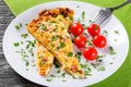 Frittata with deviled eggs, ricotta, onion, tomatoes and bell peppers Royalty Free Stock Photo