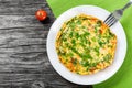 Frittata with deviled eggs, ricotta, onion, tomatoes and bell peppers Royalty Free Stock Photo