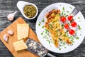 Frittata with deviled eggs, ricotta, onion, tomatoes and bell peppers Royalty Free Stock Photo