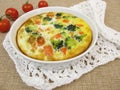 Frittata with rice, carrots, broccoli and tomatoes