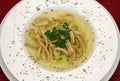Clear soup with sliced pancakes Royalty Free Stock Photo