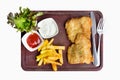 Fritters fish steak served with french fries on white b Royalty Free Stock Photo