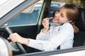 Frivolous woman driving the car Royalty Free Stock Photo