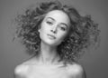 Frizzle hair Beautiful woman. black and white portrait