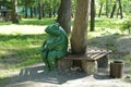 frog green park bench tree