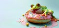 frog indulges in a massive pink donut adorned with colorful sprinkles and luscious icing. The Frog is eating a huge pink donut Royalty Free Stock Photo