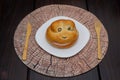FROG SHAPED BREAD WITH HAMM and bamboo cuterly  on a wooden table Royalty Free Stock Photo